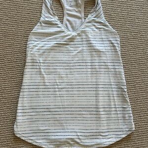 Nike Dri-Fit v-neck racerback athletic tank top white with blue stripes.